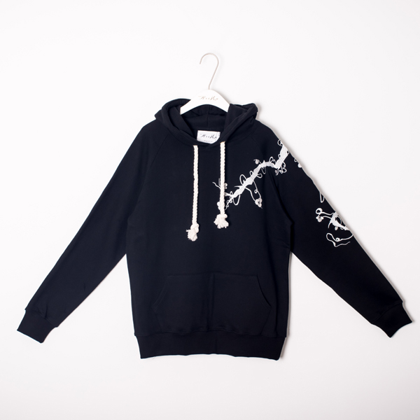 black hoodie with white embroidery and a hanger