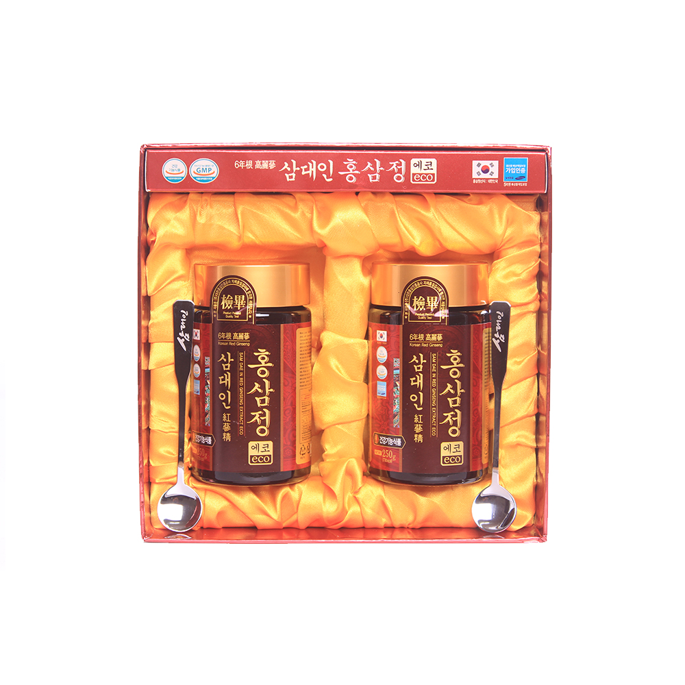two bottles of red ginseng in a red box