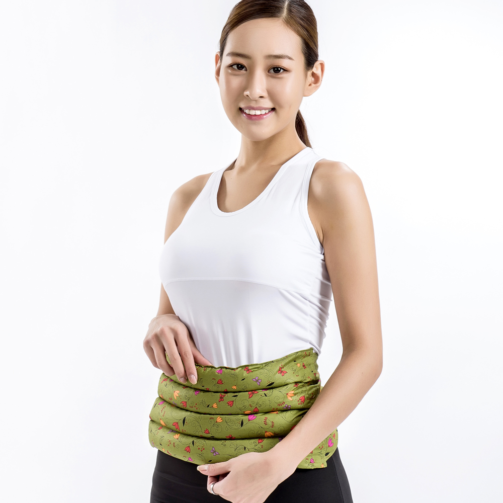 woman wearing a green waist support belt