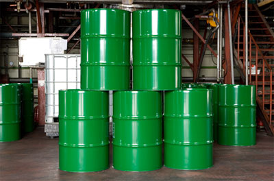 green oil barrels
