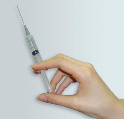 Insert a used needle