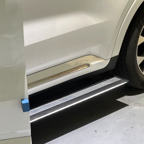 Side auto steps attached to the car