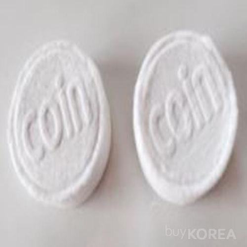 compressed coin tissue