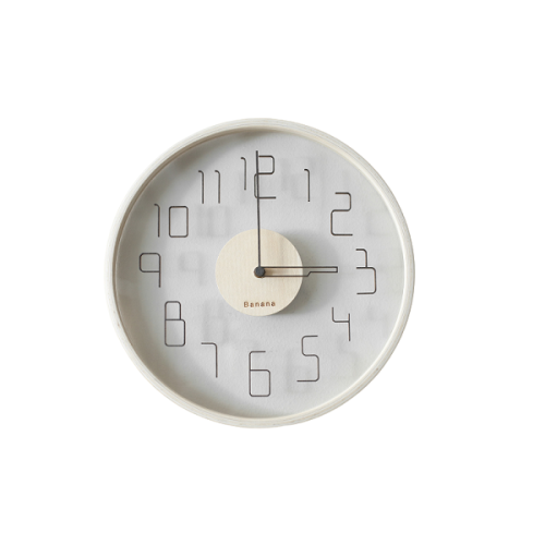 white wall clock with black numbers and white hands