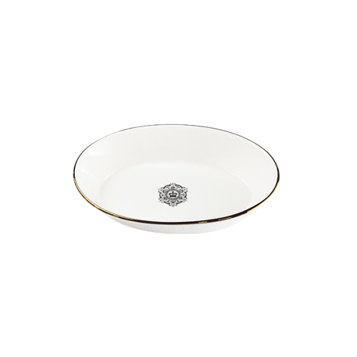 the bowl with a silver rim and a white interior