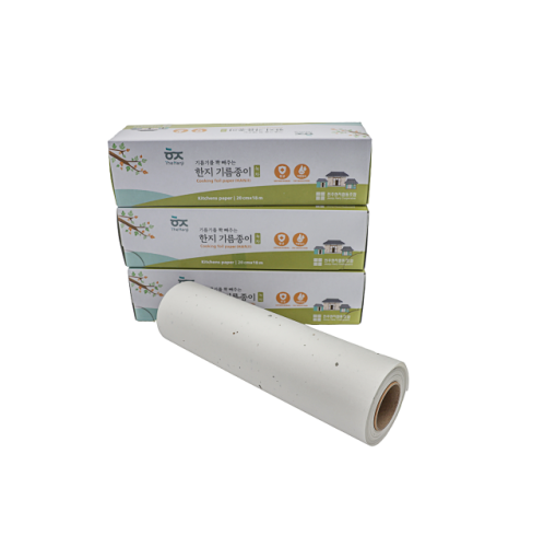 a roll of paper towels and a box