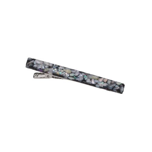 a hair clip with a black and white pattern