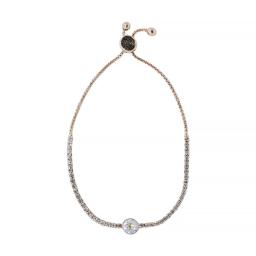 a gold chain bracelet with a black onyx stone