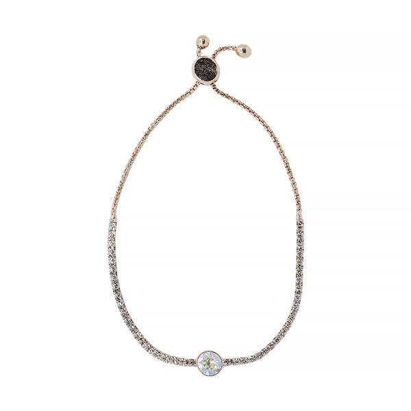 a gold chain bracelet with a black onyx stone