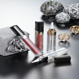 Airless Cosmetic Dispenser of which button is conveniently located on shoulder