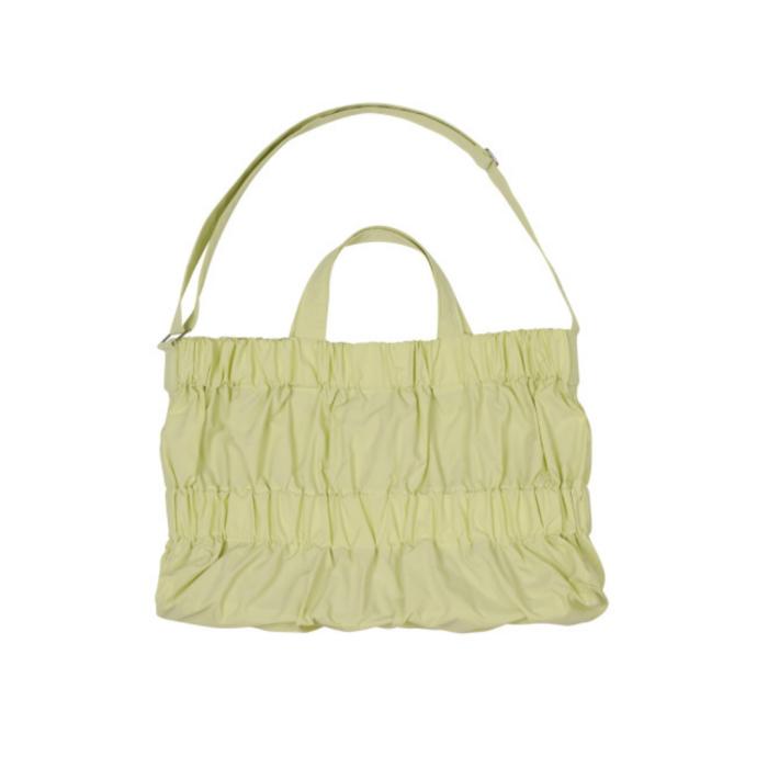 the tote bag in light green