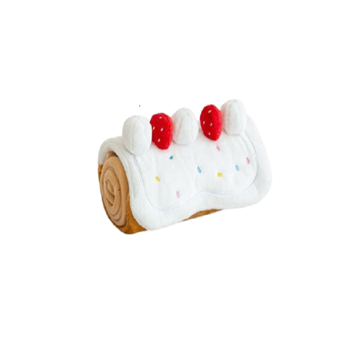 a cake roll with two cherries on top