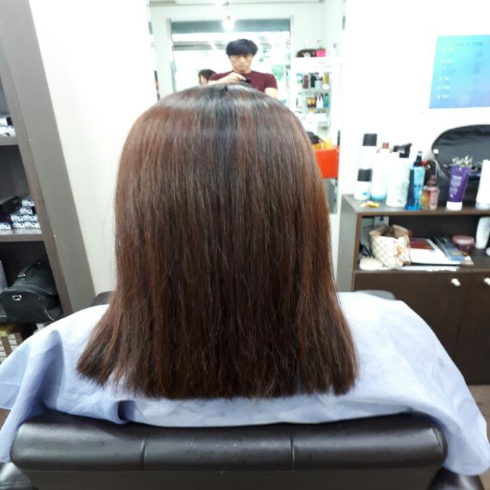 Hair with magic straight finish after applying MPI