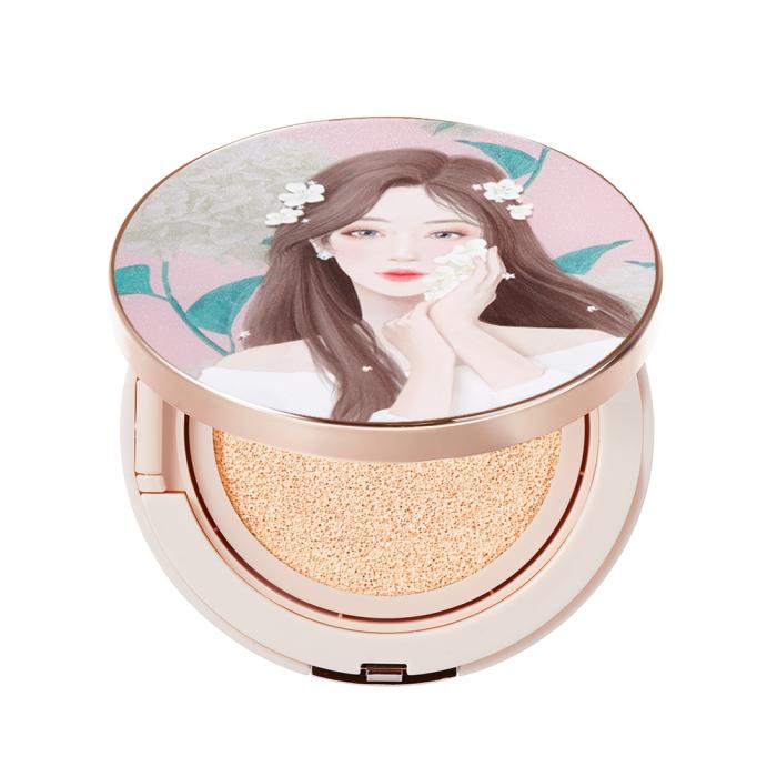 a powder compact with a girl and flowers on the lid