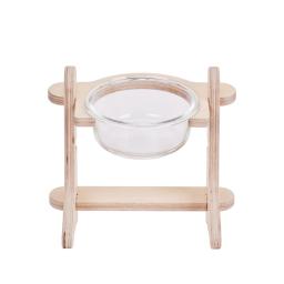 a wooden stand with a glass bowl on it