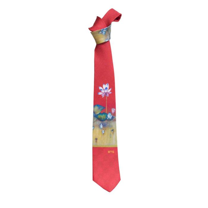 a red tie with a yellow and blue design