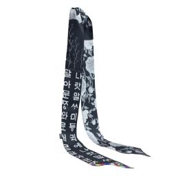 a black and white scarf with the words