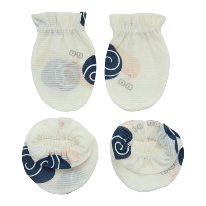 four different sizes of reusable cloth diapers