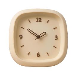 the clock with a white face and black hands