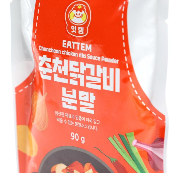 A vibrant Korean cooking powder pouch for Chuncheon chicken ribs sauce, presented in a flexible stand-up package with a clear white outer frame and a bold red front panel. The design feels energetic and appetizing, with sharp white lettering, a playful logo, and illustrated ingredients and a prepared dish that signal spicy, savory flavor. The 90 g size is prominently shown, and the overall look is clean, modern, and food-forward, appealing to shoppers looking for convenient Korean-style cooking flavors.