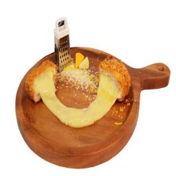 cheese and bread on a wooden board