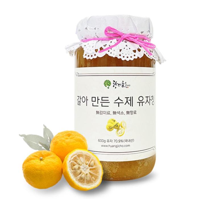 a jar of honey and lemons