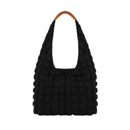 a black tote bag with a wooden handle