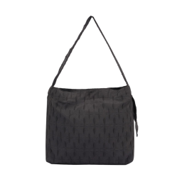 black quilted bag with a long strap and tassels