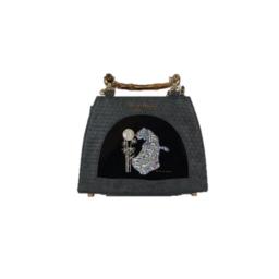 the small black bag with a cat and a flower on the front