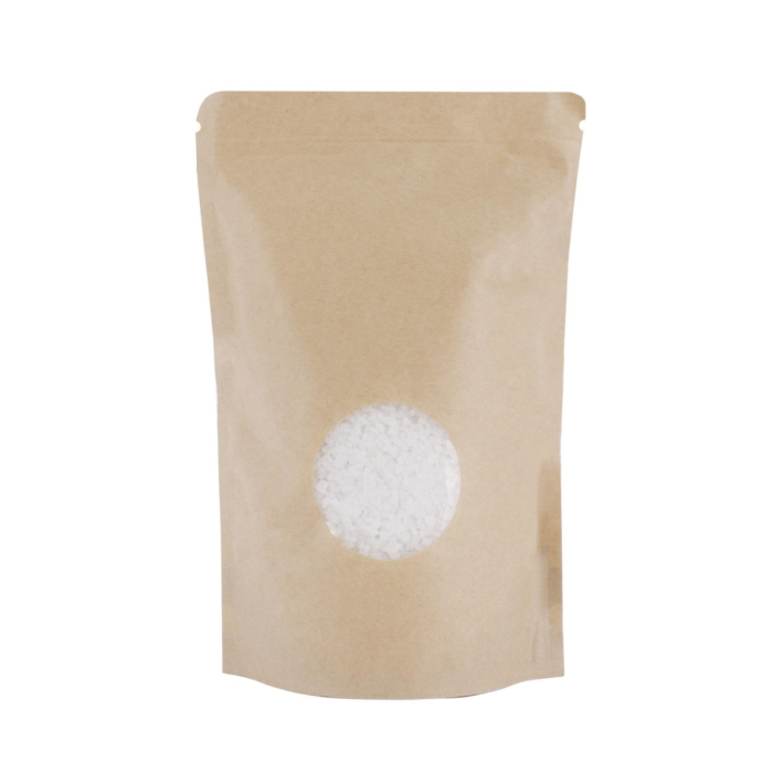 white sugar in a bag on a white background