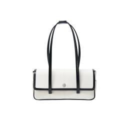 white leather handbag with black handles