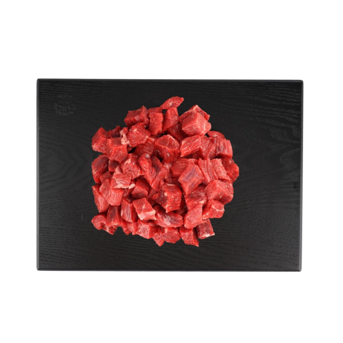 raw diced beef on a cutting board