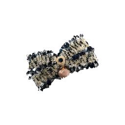 a black and gold sequin bow hair clip