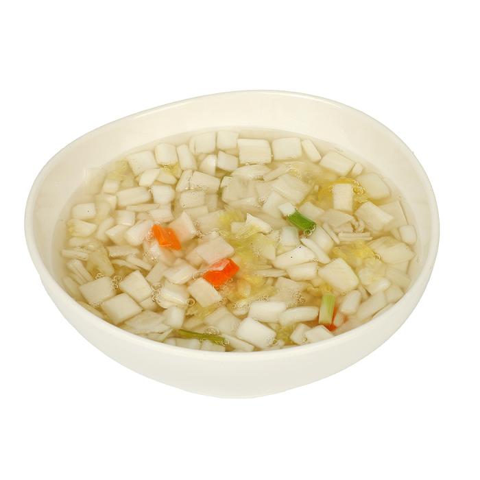 vegetable soup in a bowl on a white background