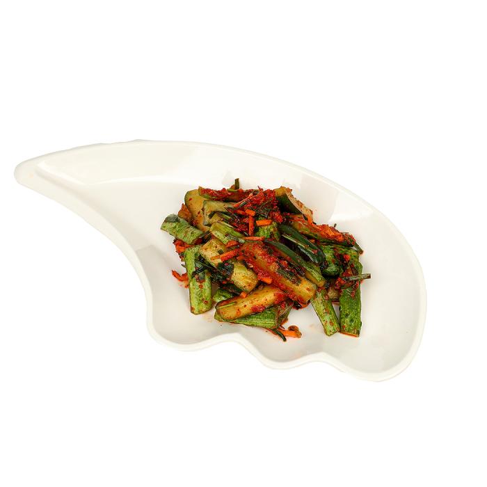 stir-fried vegetables on a white plate