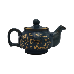 teapot with fish and plants