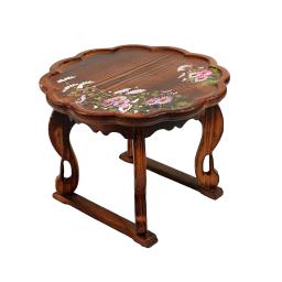 a wooden table with flowers on it