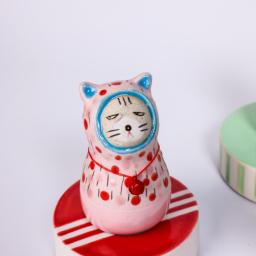 GaGa Cat : Ceramic figurine of a cat dressed in a panda & dragon outfit