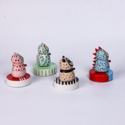 GaGa Cat : Ceramic figurine of a cat dressed in a panda & dragon outfit