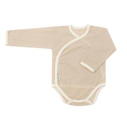 organic cotton long sleeve onesie in beige with white trim