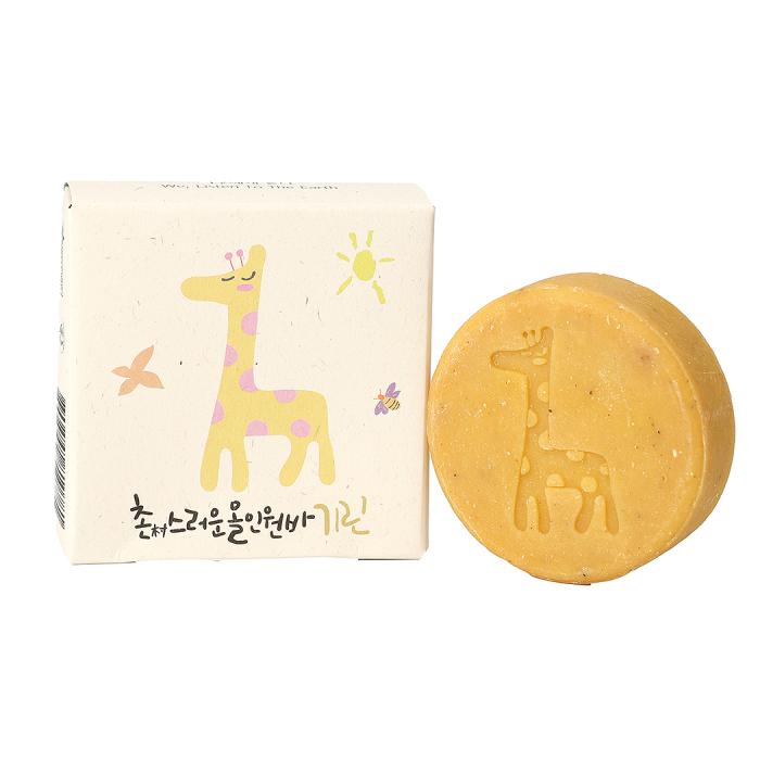 a box and a bar of soap with a giraffe on it