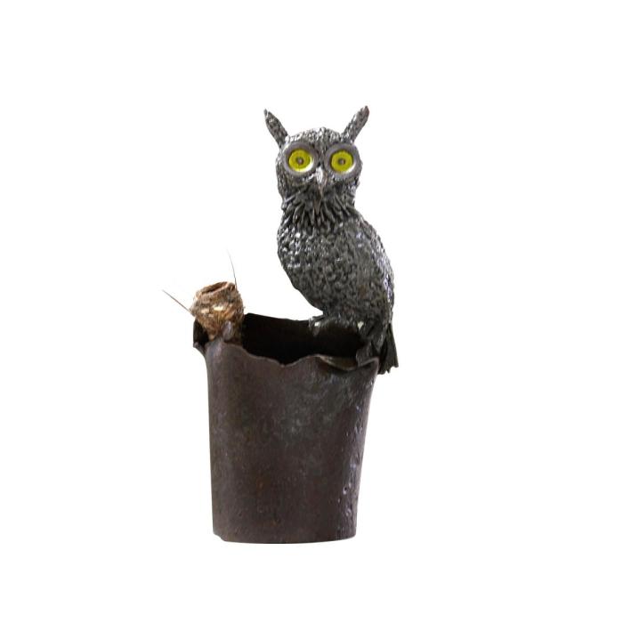 this image stands for: Owl in a flower pot