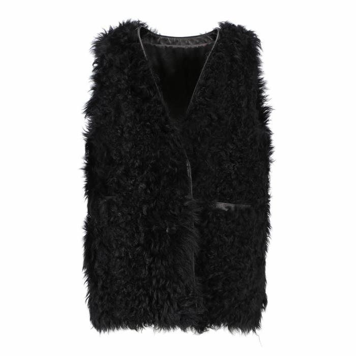 Curly lamb vest with point as lamb leather.
