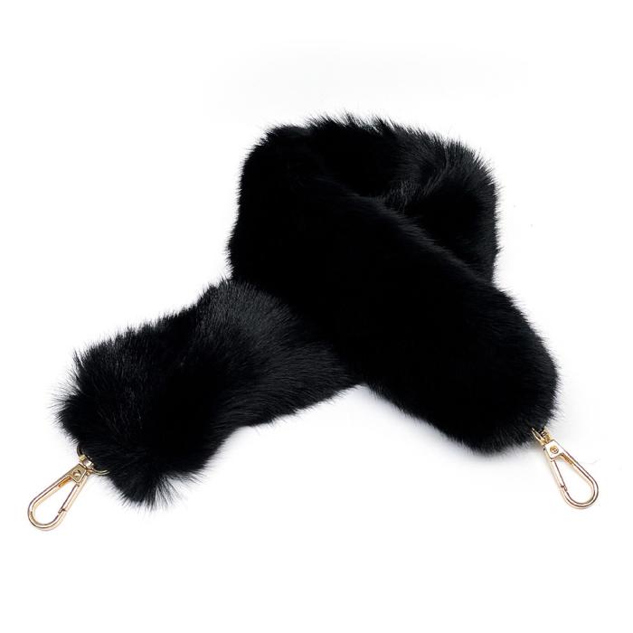 black fur and gold tassels
