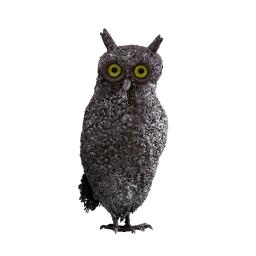 a metal owl sculpture