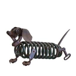 a metal dog and a spring