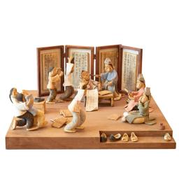 this image stands for: Chinese craftsmen carving wood