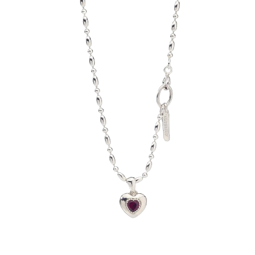 a sterling silver chain with a heart charm and a key