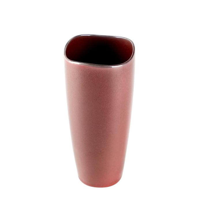 a red ceramic vase