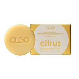 AGLIO Citrus Shampoo Bar. The shampoo bar is yellow with a white label.